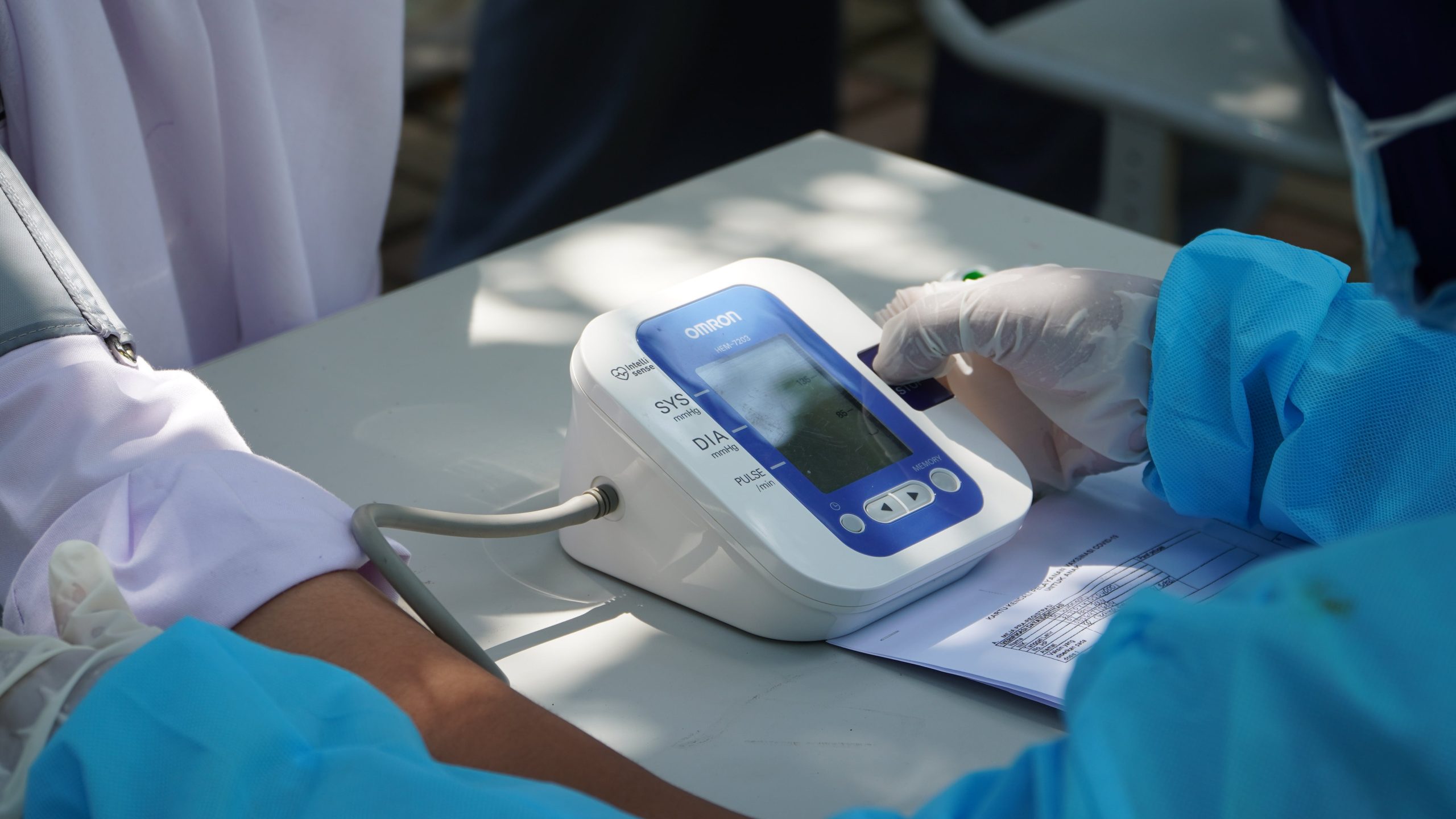 Public health specialty doctor treats patient